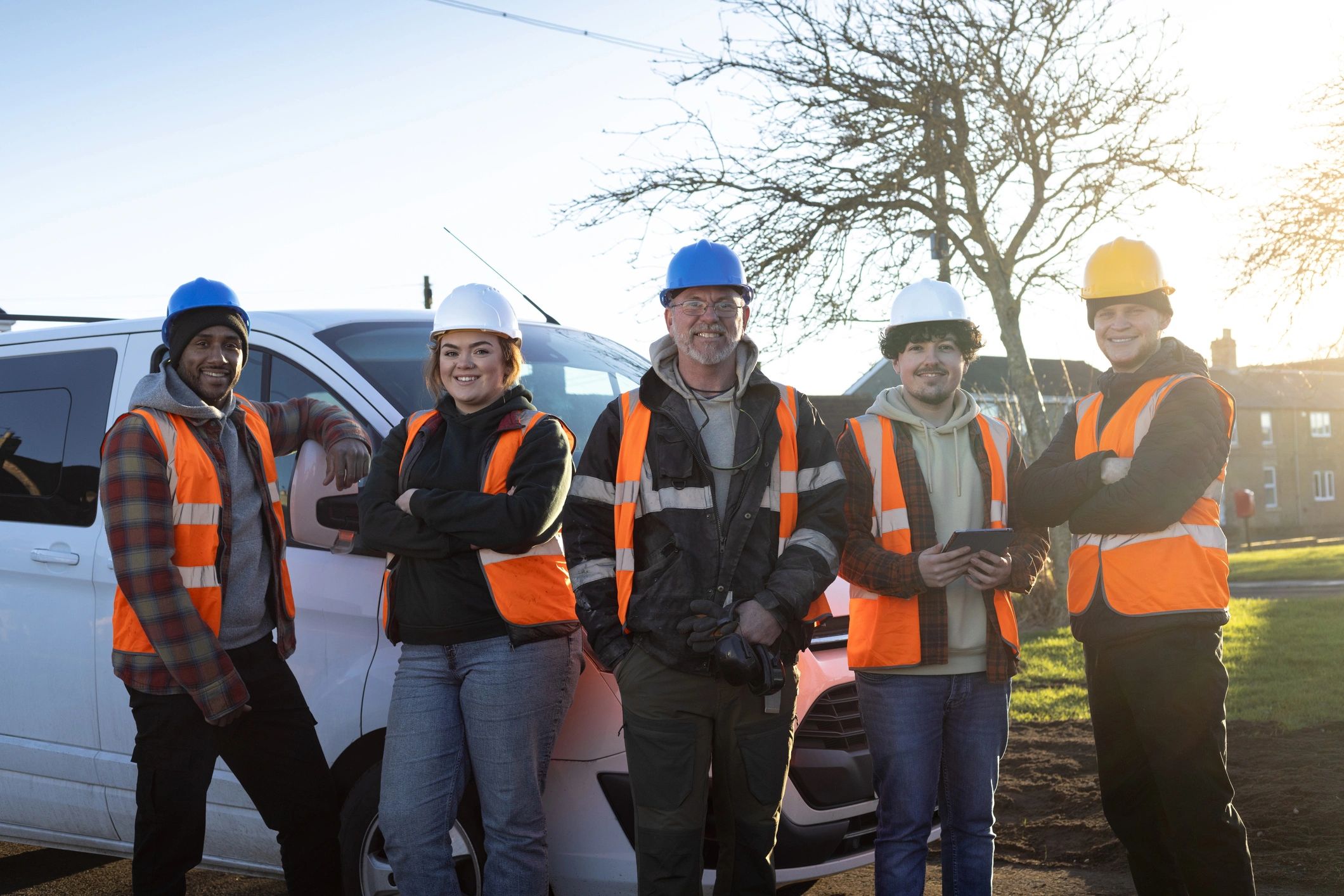 Operations crew standing together in safety gear