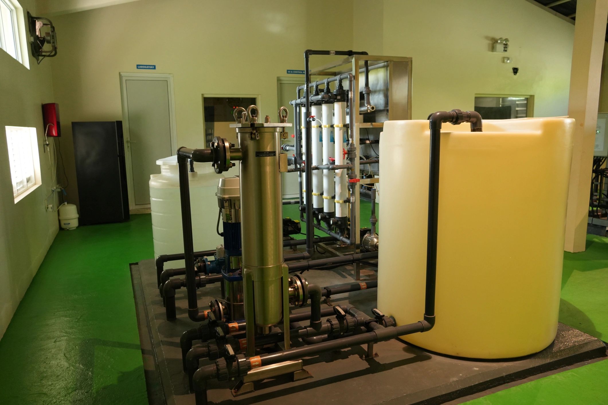 Industrial water processing system inside a modern facility